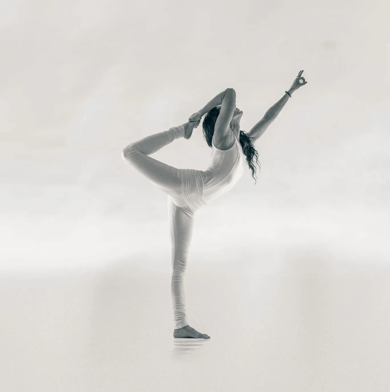 MRY Advanced: a yogini in dancer pose, natarajasana