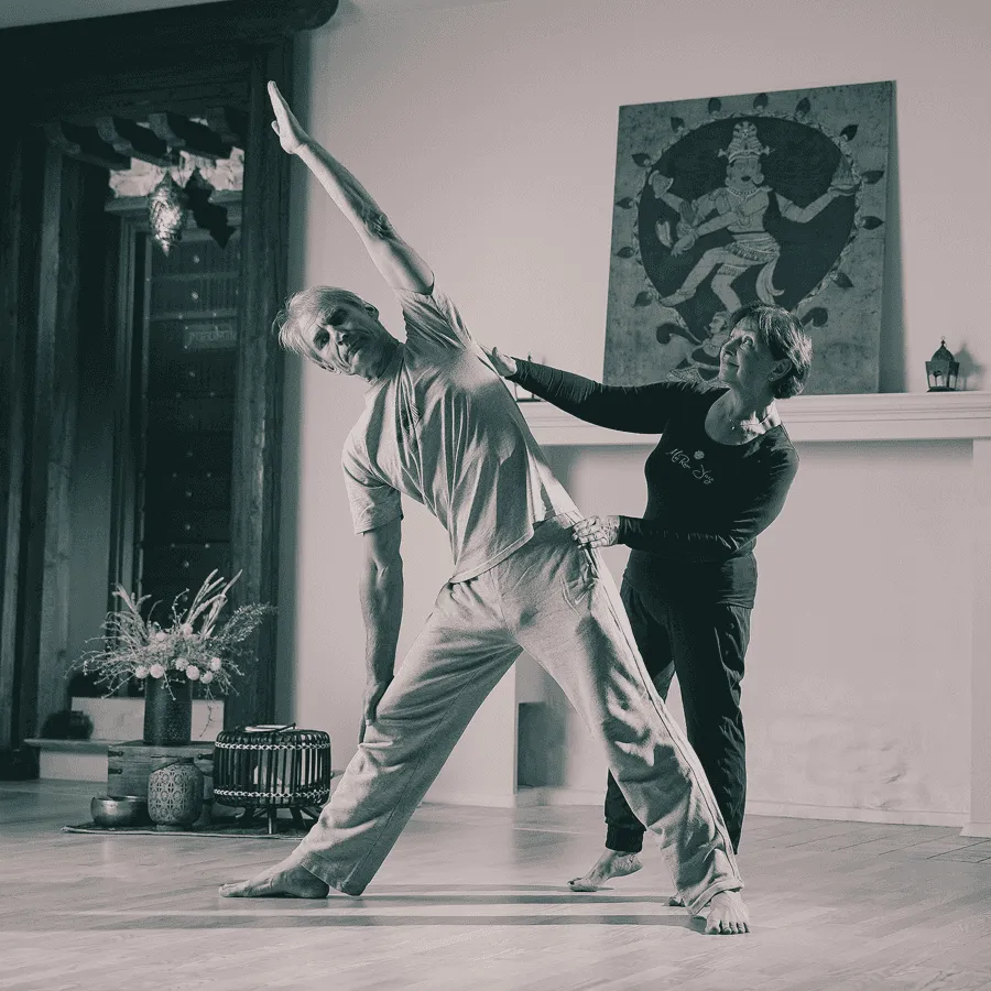 MRY Basic Therapy: a teacher adjusts a student's posture